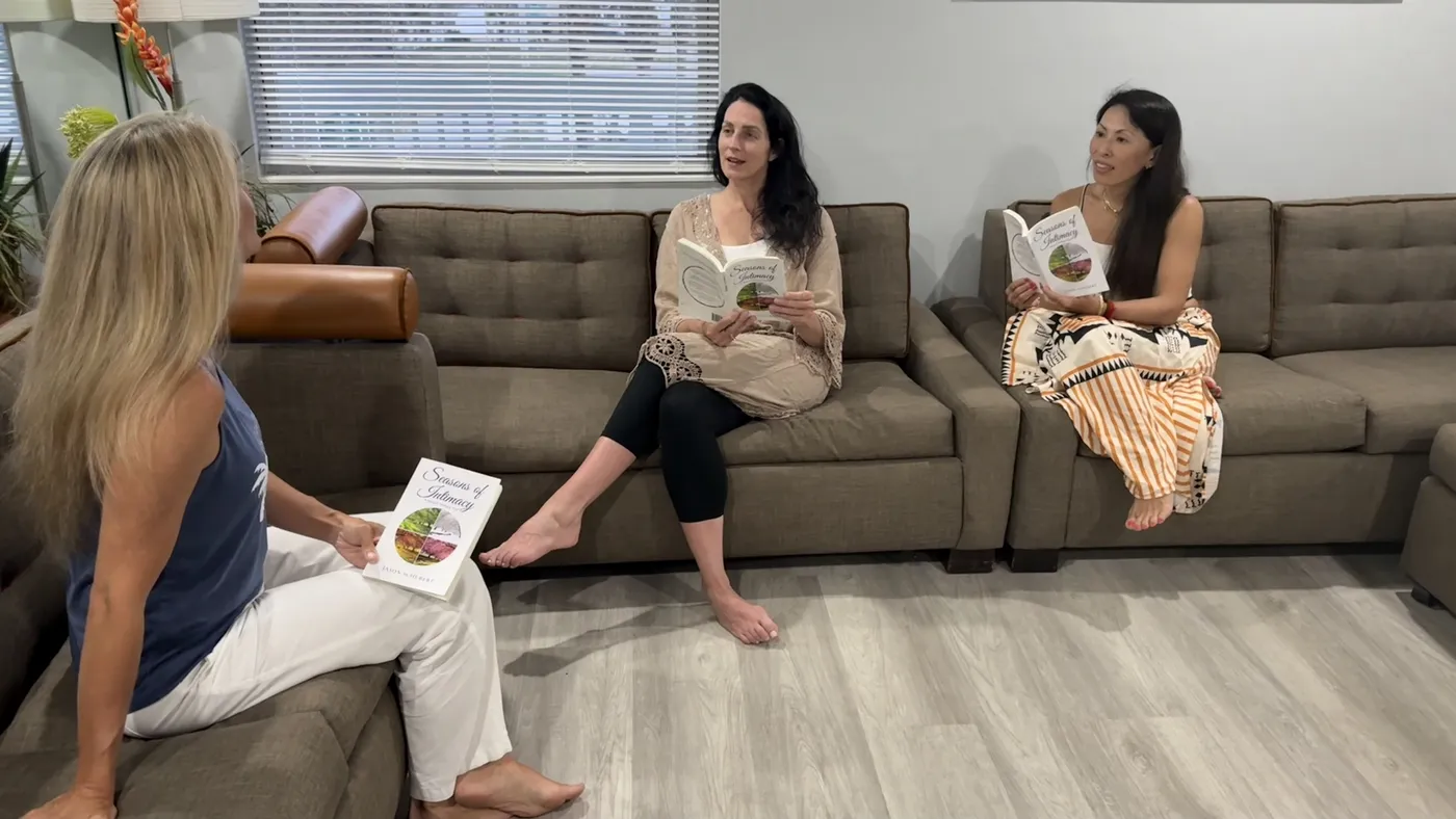 Three women discussing Seasons of Intimacy at a book club